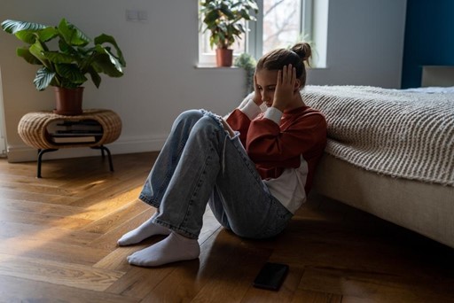 woman sitting on floor